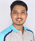 male with dark brown hair in blue and white shirt