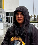 Male wearing black hoodie